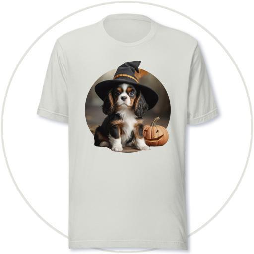 Cavalier pup learning magic in a Witches hat.